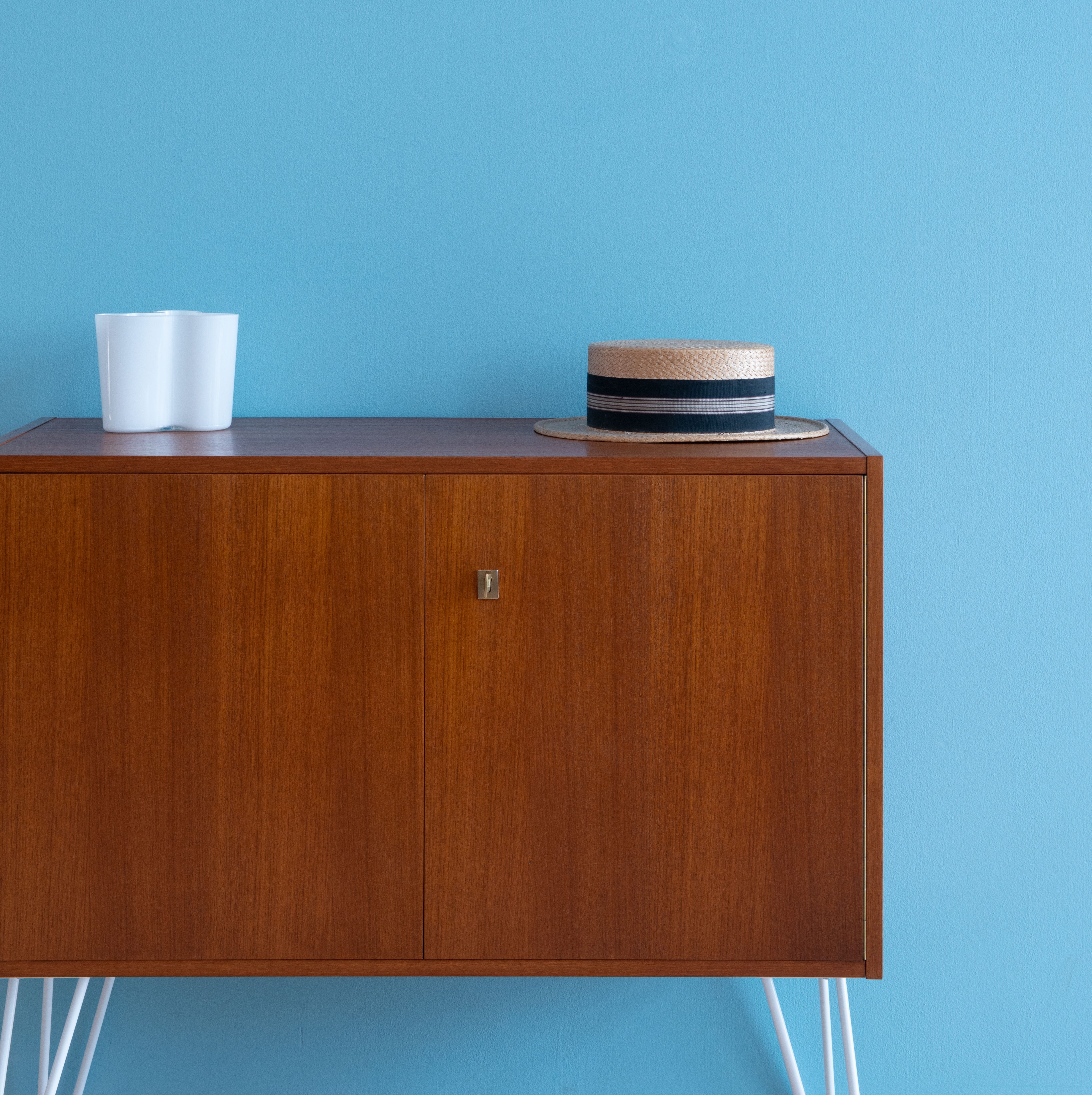Teak Cabinet with Hairpin Legs Available at heyday möbel.