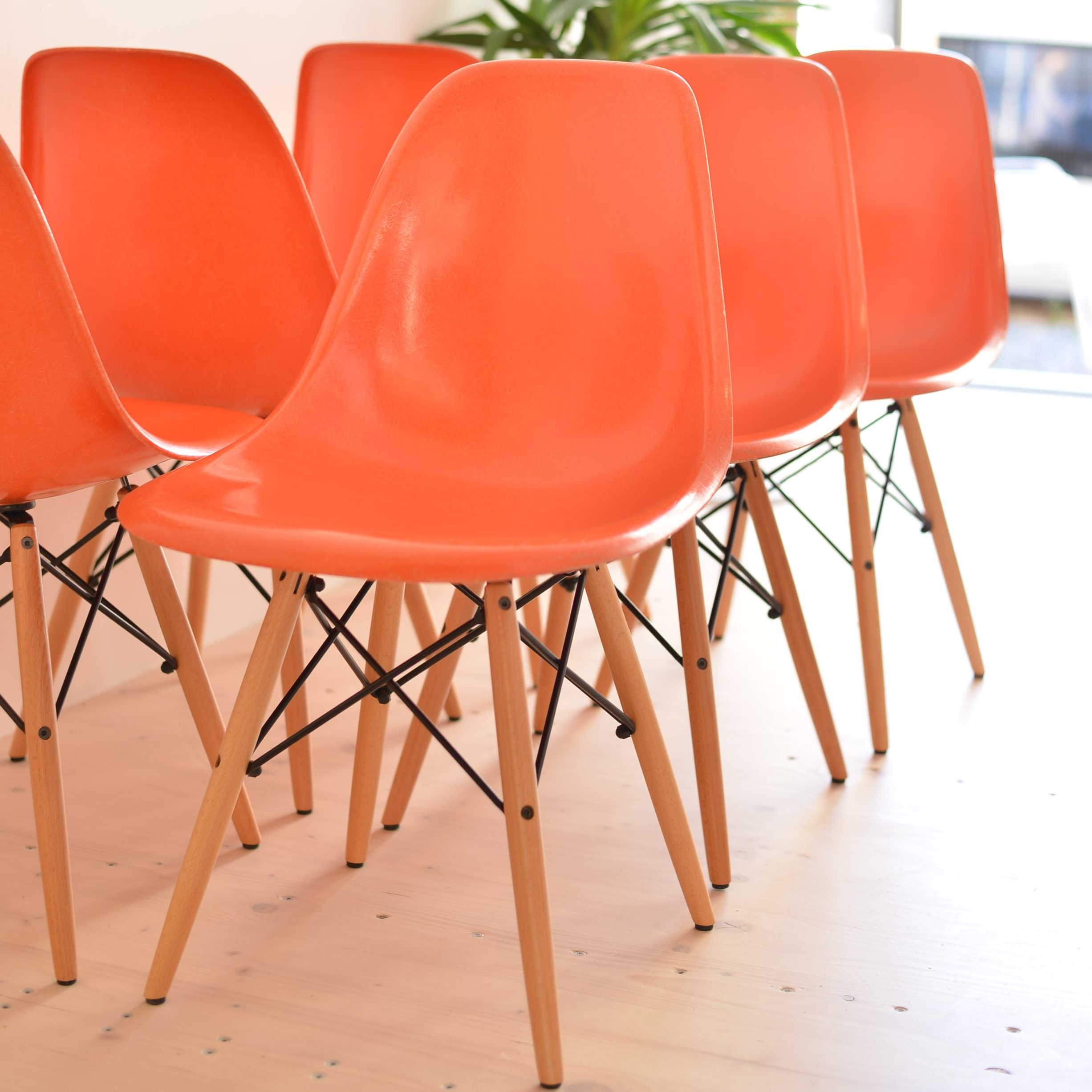 Orange Eames Side Chair with Dowel Base - Set of Six