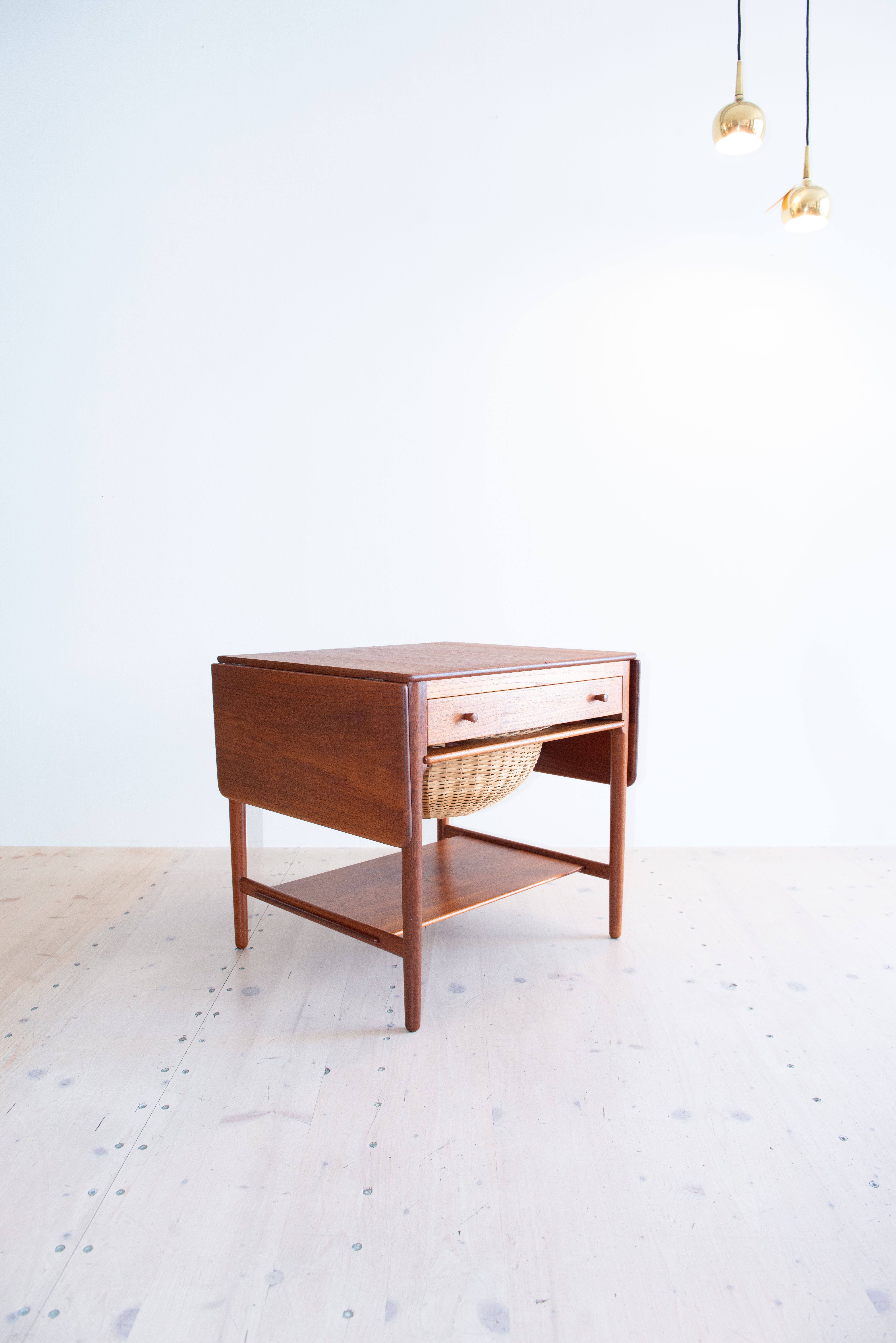 AT33 Teak Sewing Table by Hans J. Wegner. Made by Andreas Tuck. Made in Denmark, 1950s. Available at heyday möbel, Grubenstrasse 14, 8045 Zürich, Switzerland.