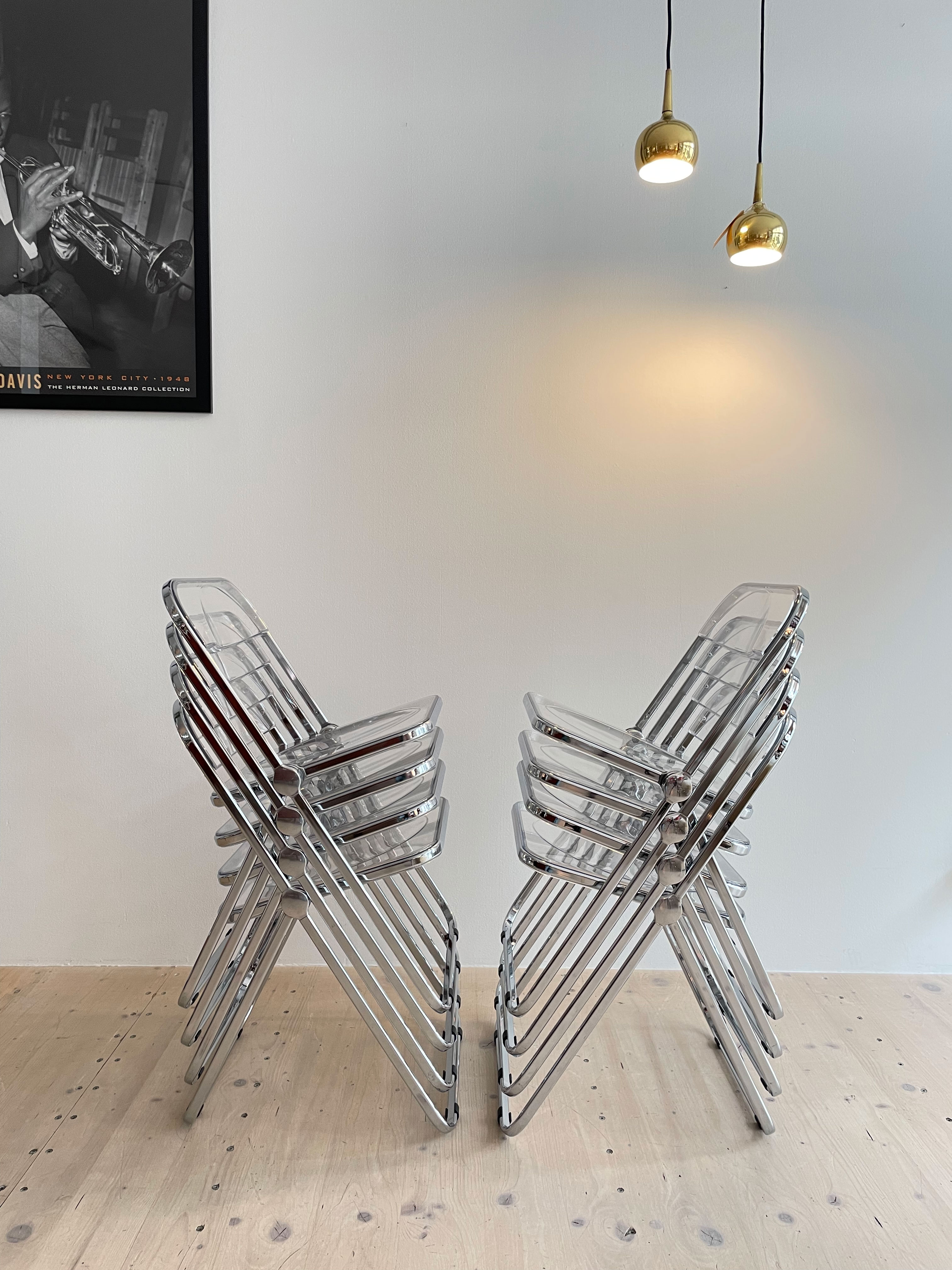 Transparent Plia Folding Chairs by Giancarlo Piretti. Available at heyday möbel, Grubenstrasse 19, 8045 Zürich, Switzerland. Mid-Century Modern Furniture and Other Stuff.