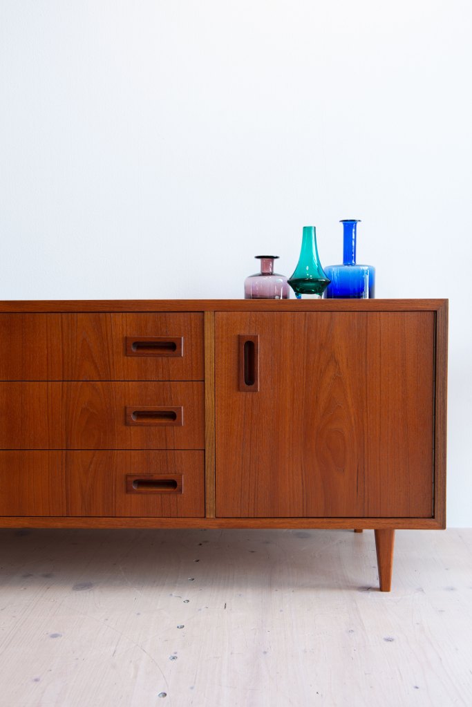 Scandinavian Teak Sideboard/Lowboard. The unit is ideal for a TV or stereo unit. Available at heyday möbel. Grubenstrasse 19, 8045 Zürich, Switzerland. Mid-Century Modern Furniture and Other Stuff.
