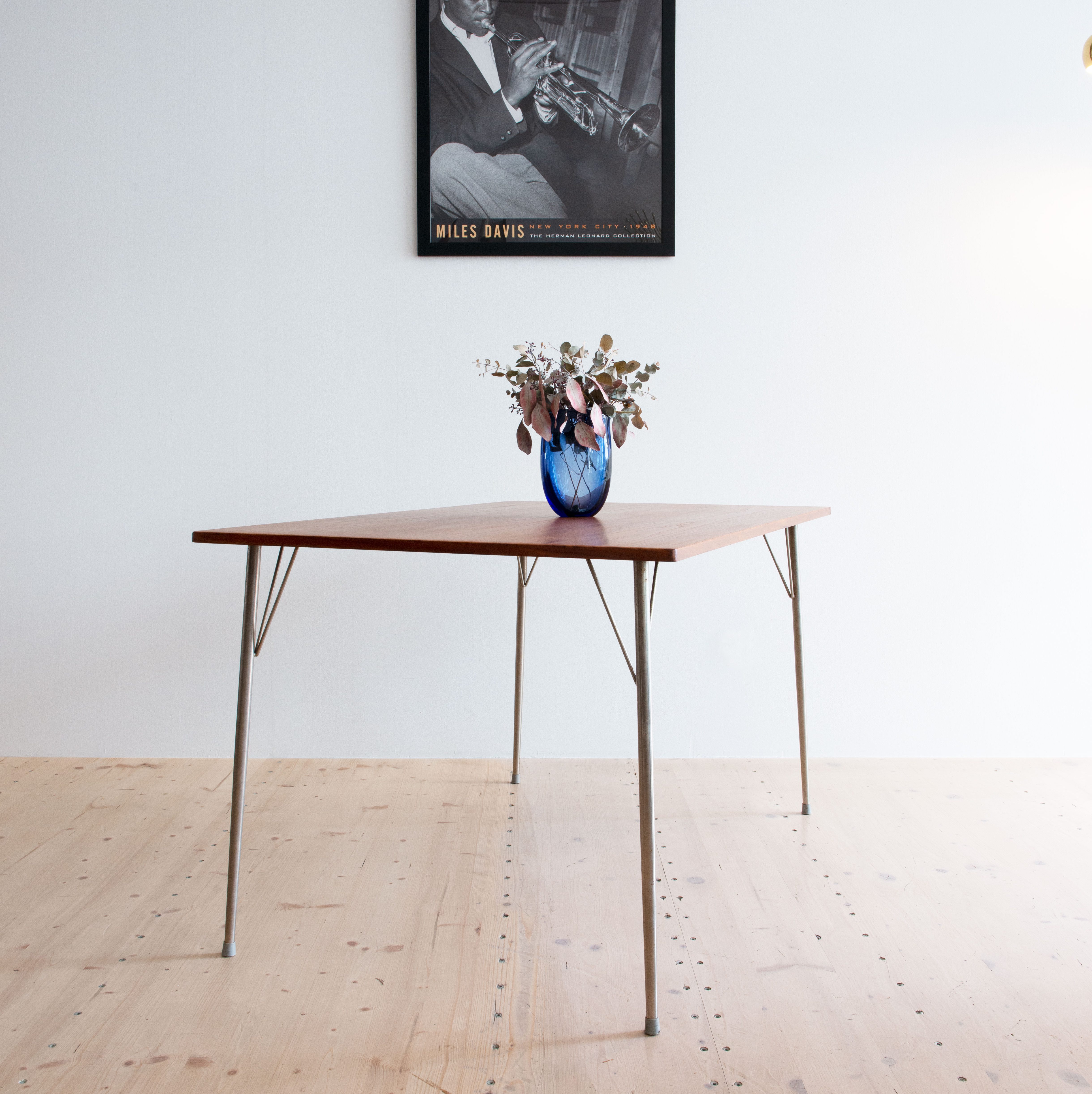 Arne Jacobsen Style Teak Dining Table. Produced in Denmark in the 1960s. Available at heyday möbel, Grubenstrasse 19, 8045 Zürich, Switzerland.