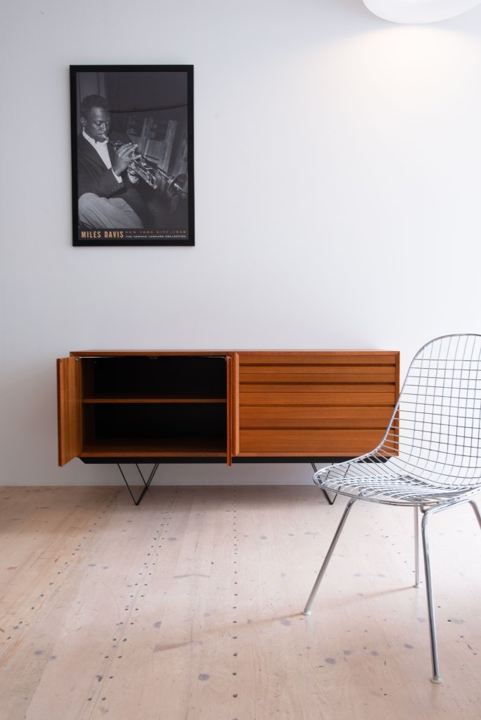 Cado Sideboard with Steel Base No.1. Wooden cabinet by Poul Cadovius. Steel base newly produced locally.