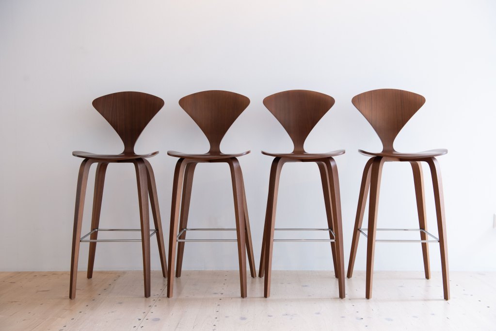 Norman Cherner Bar Stools in Walnut. Bent plywood, designed in the USA, 1958.