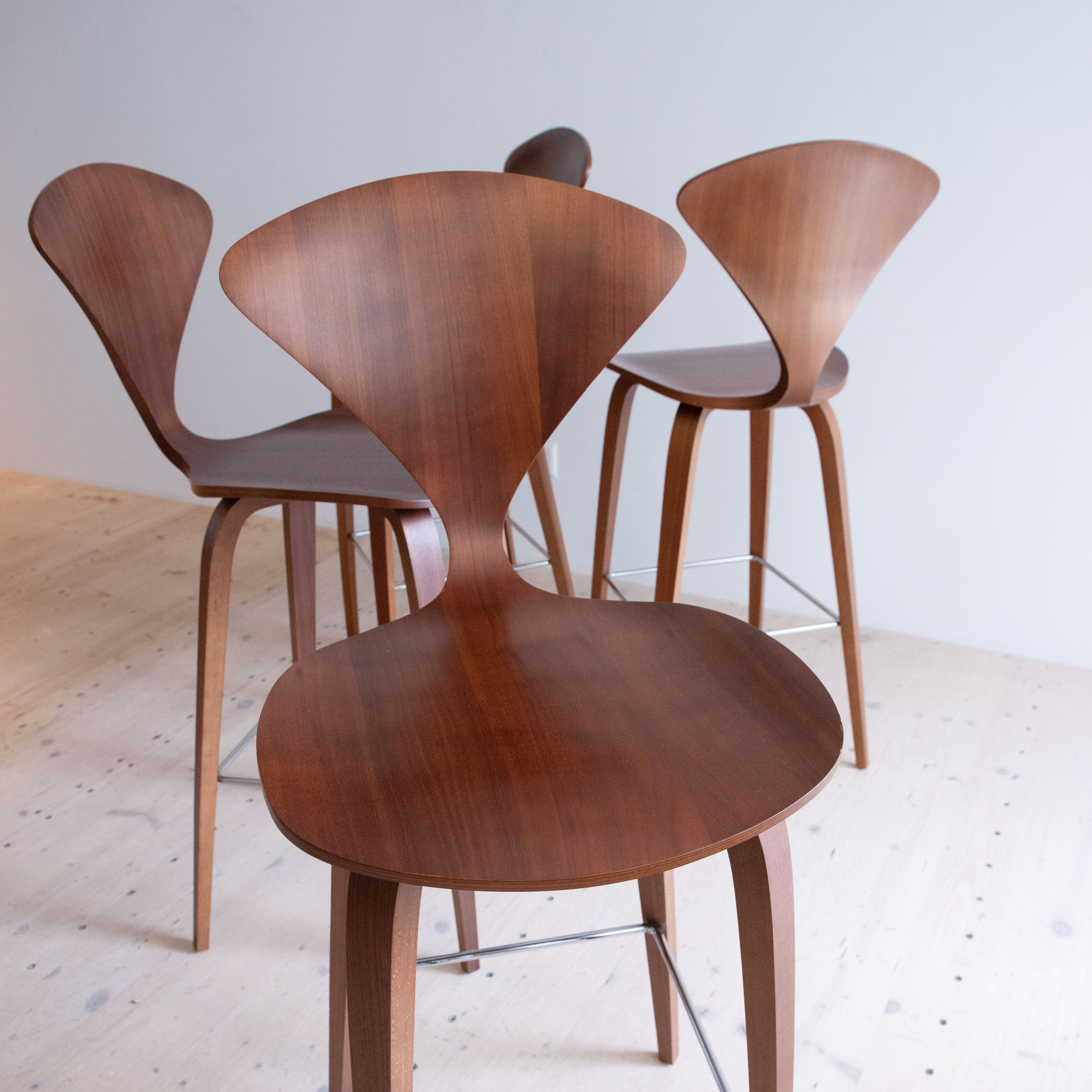 Norman Cherner Bar Stools in Walnut. Bent plywood, designed in the USA, 1958.