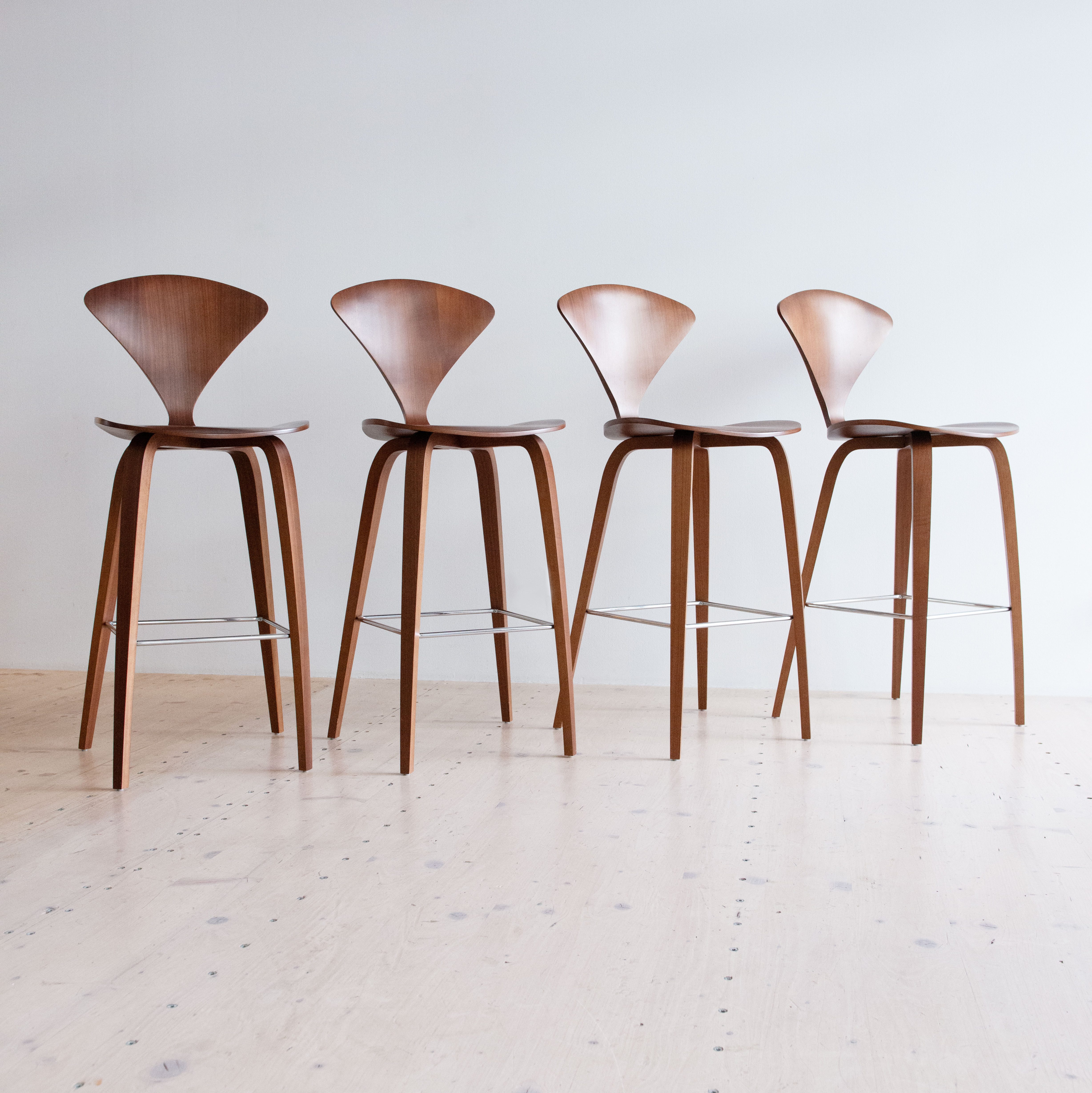 Norman Cherner Bar Stools in Walnut. Bent plywood, designed in the USA, 1958.