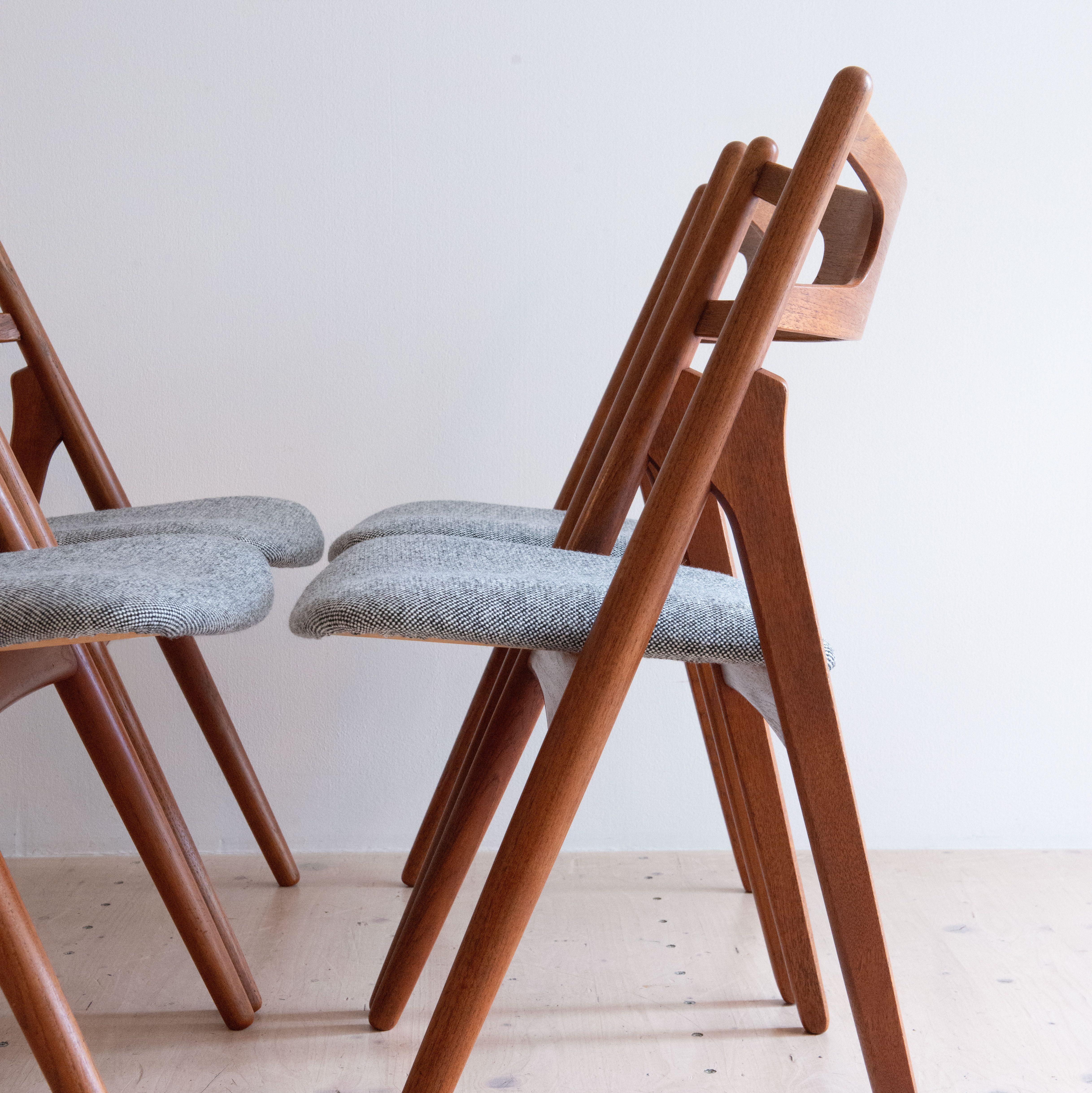 CH 29 Sawbuck Dining Chairs in Teak by Hans J. Wegner, By Carl Hansen and Son Denmark. Available at heyday möbel, 8045 Zürich, Switzerland.