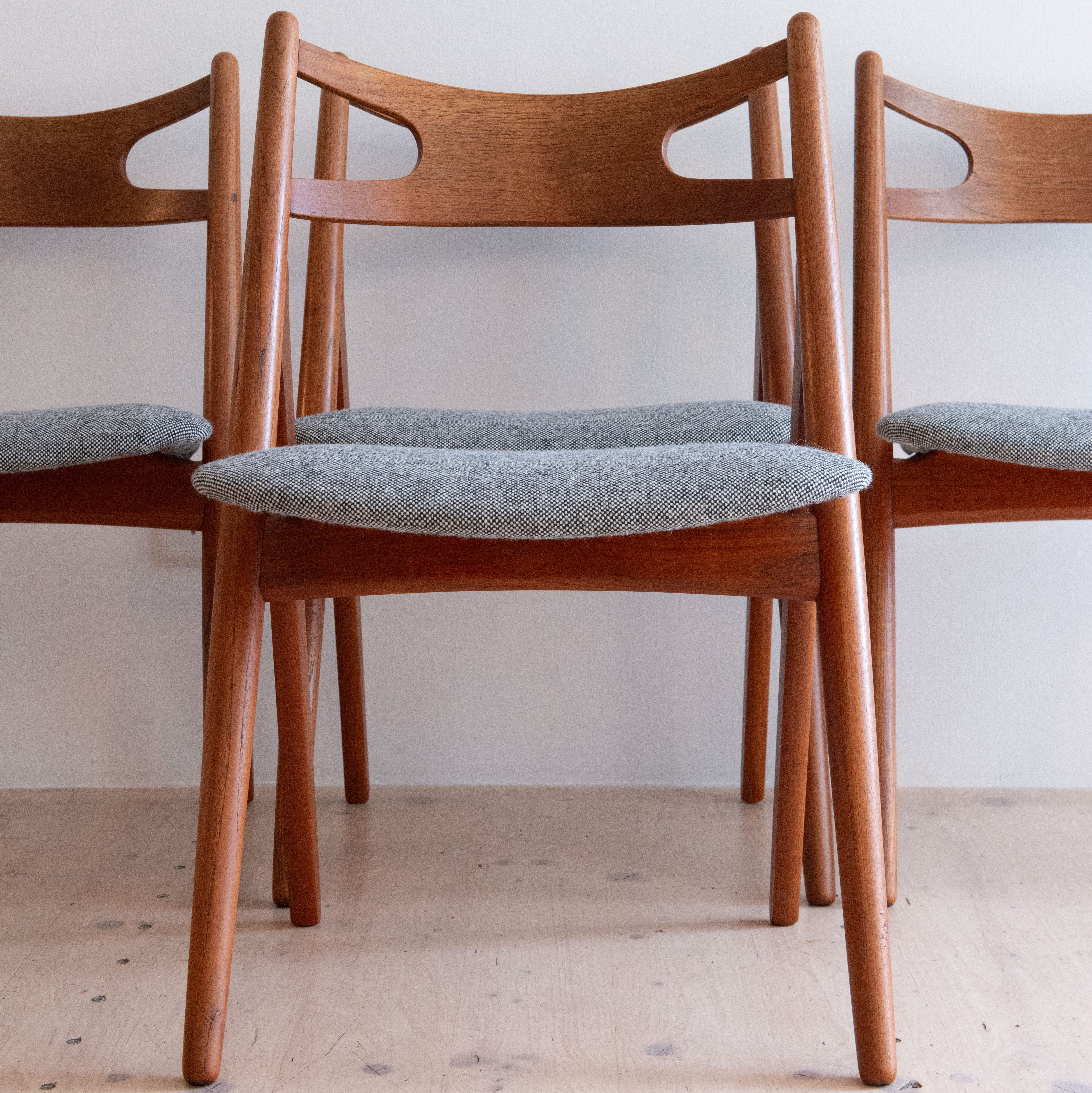 CH 29 Sawbuck Dining Chairs in Teak by Hans J. Wegner, By Carl Hansen and Son Denmark. Available at heyday möbel, 8045 Zürich, Switzerland.