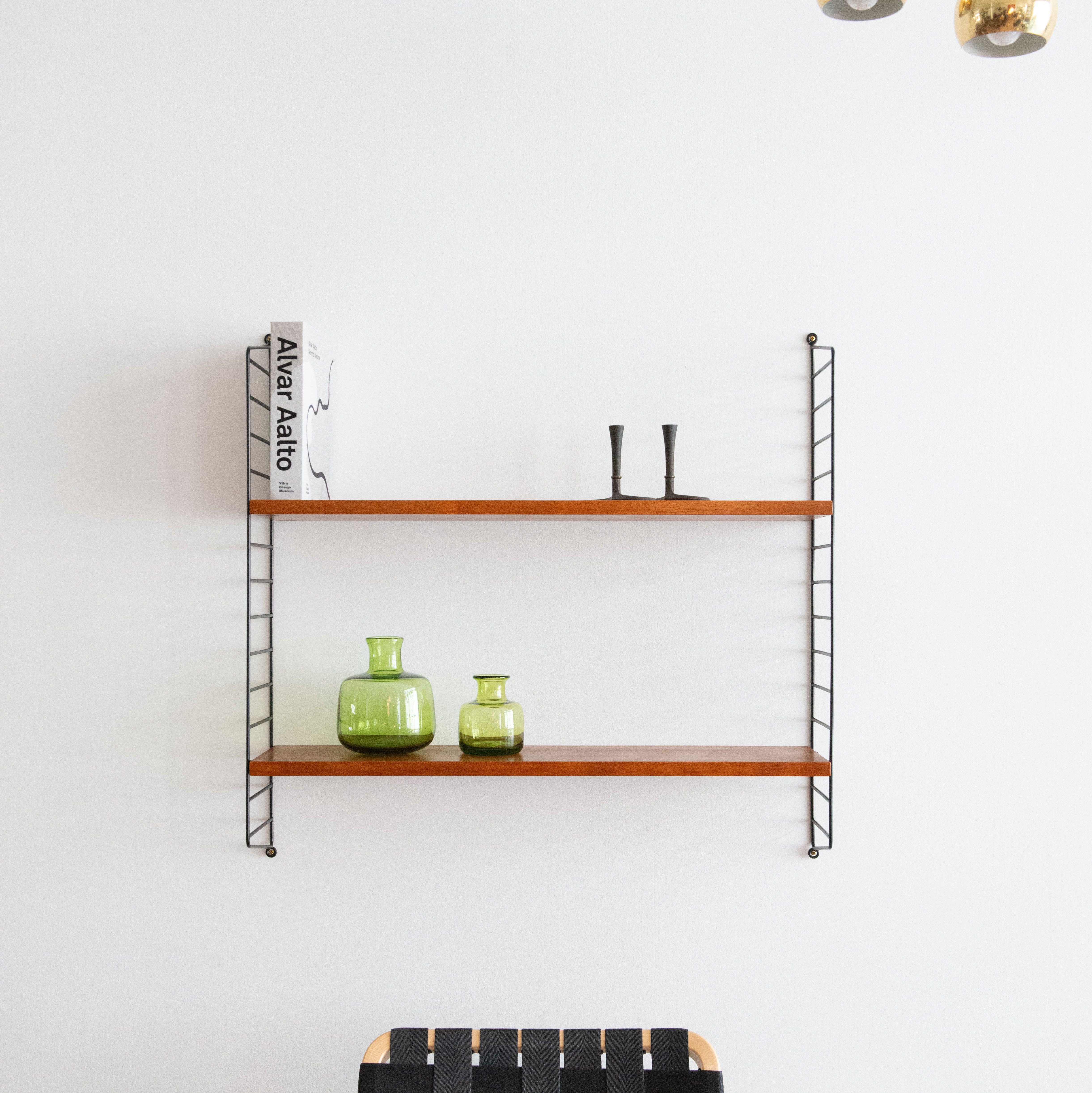 Nisse Strinning Wall Unit in Teak. Available at heyday möbel, Grubenstrasse 19, 8045 Zürich, Switzerland.