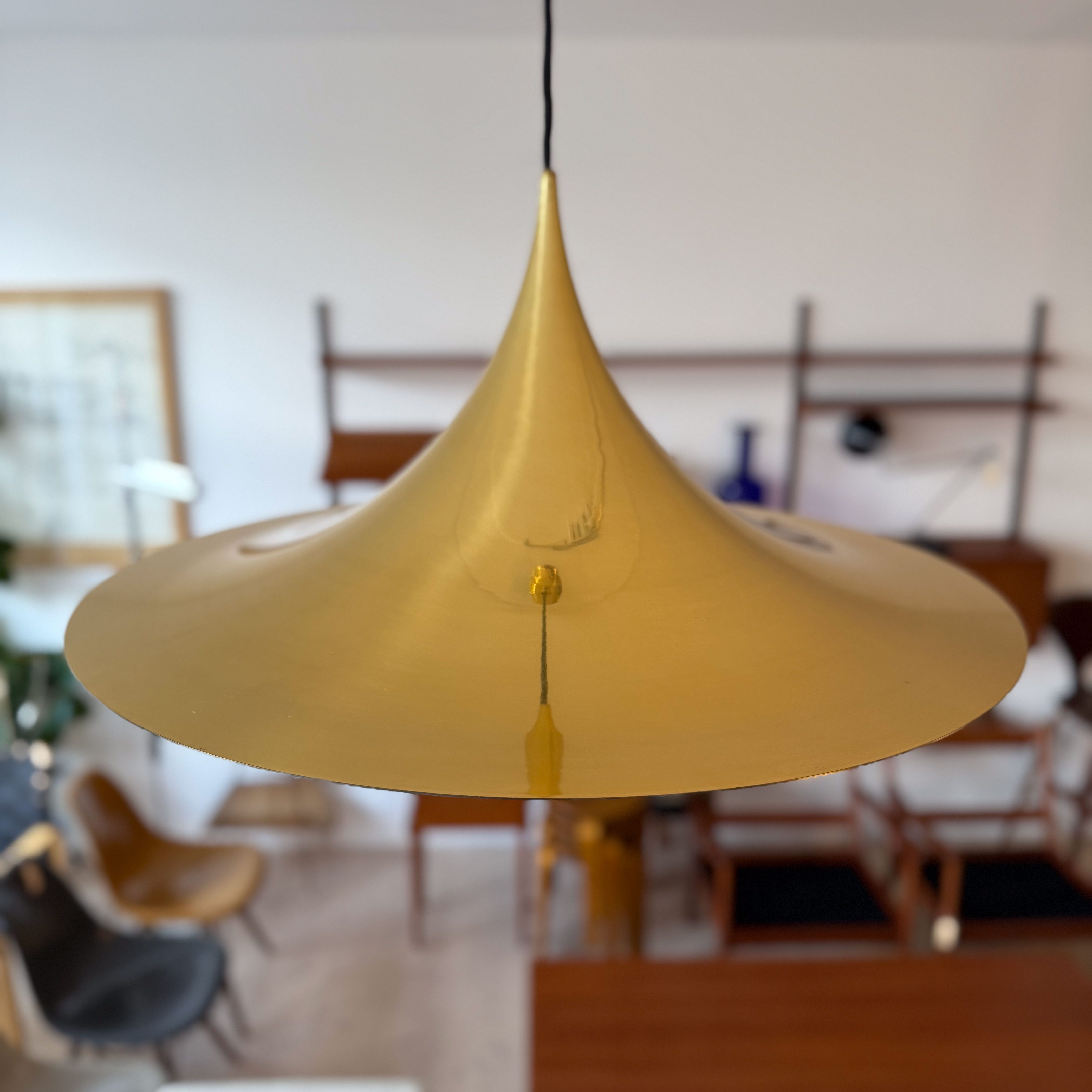 SEMI Pendant Lamp in Gold by Claus Bonderup and Torsten Thorup. Available at heyday möbel, Grubenstrasse 19, 8045 Zürich.