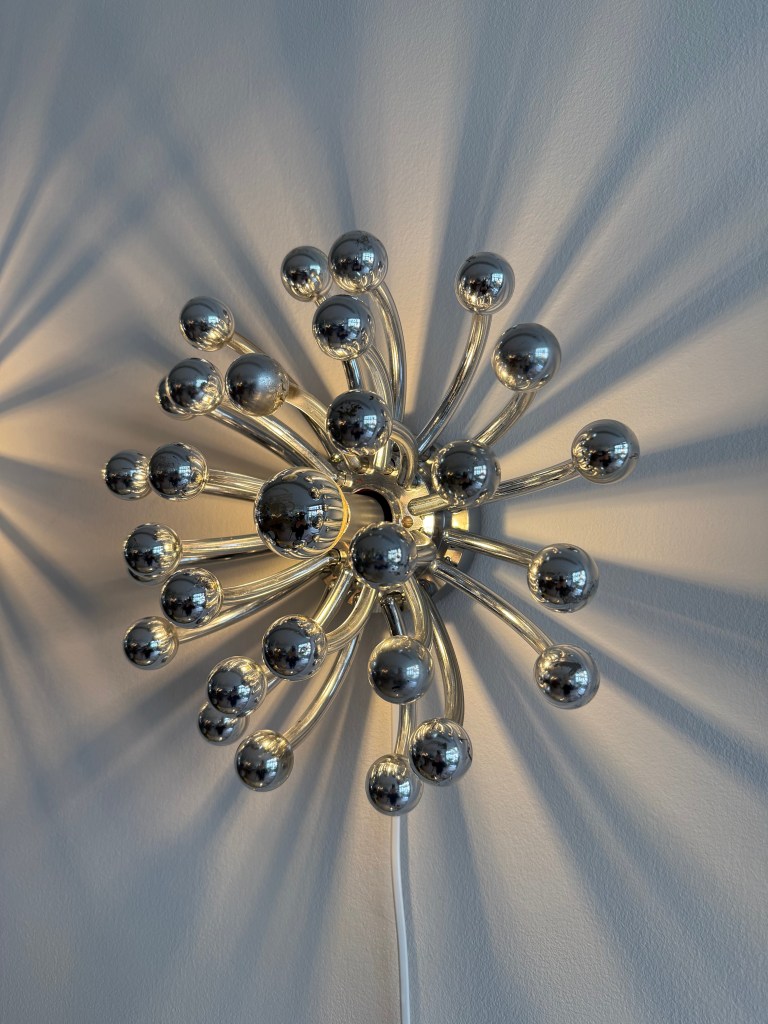 Pair of Chrome Pistillo Lamps by Studio Tetrach. Produced by Valenti Luce. Available at heyday möbel, Grubenstrasse 19, 8045 Zürich.