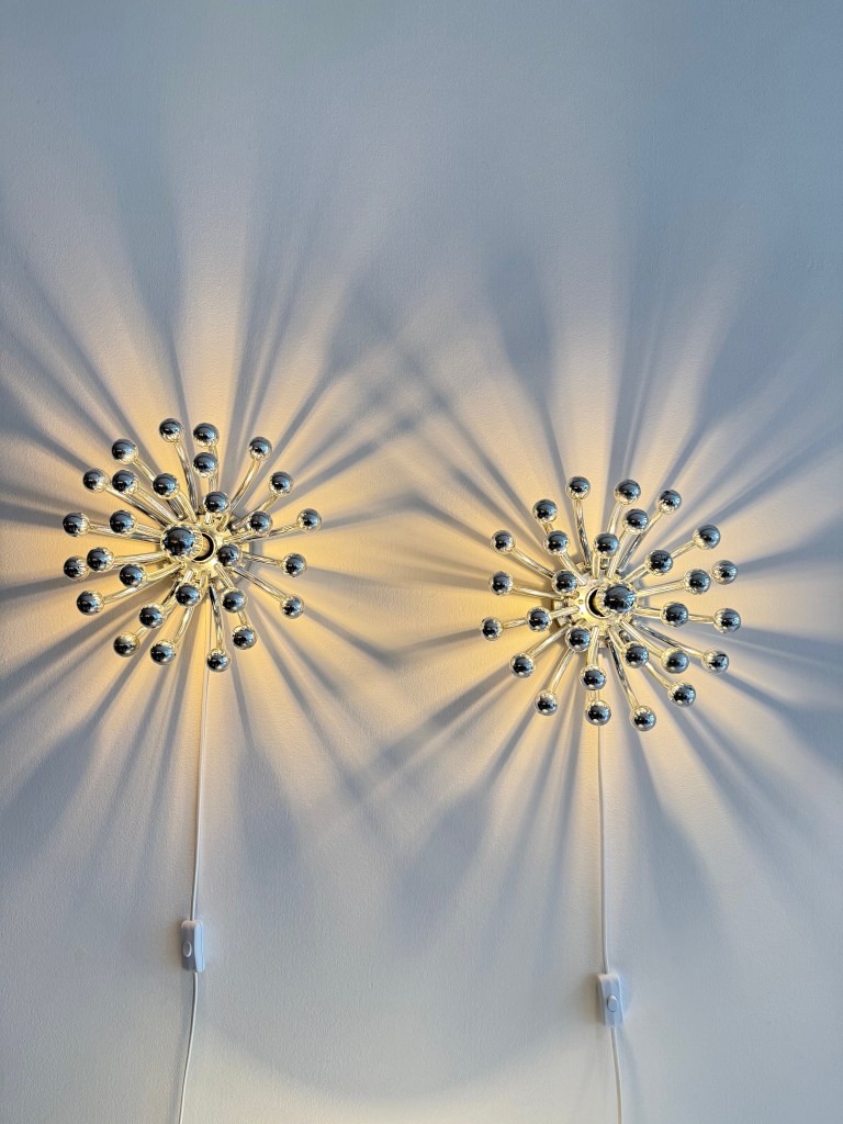 Pair of Chrome Pistillo Lamps by Studio Tetrach. Produced by Valenti Luce. Available at heyday möbel, Grubenstrasse 19, 8045 Zürich.