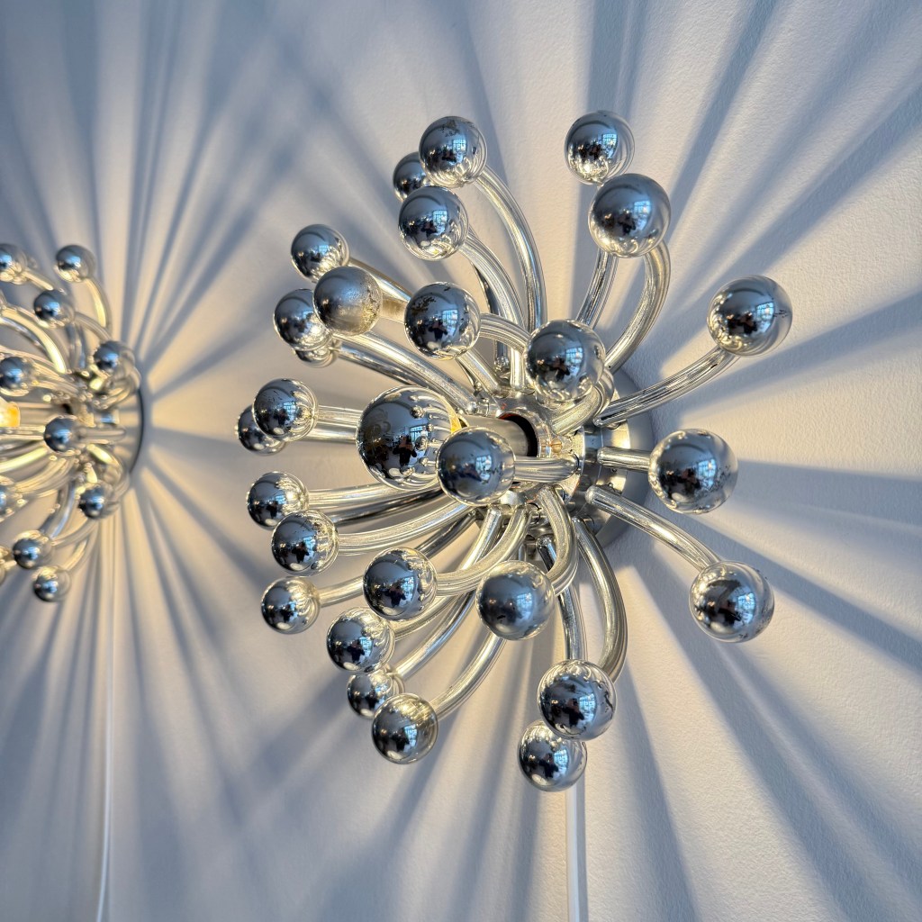 Pair of Chrome Pistillo Lamps by Studio Tetrach. Produced by Valenti Luce. Available at heyday möbel, Grubenstrasse 19, 8045 Zürich.