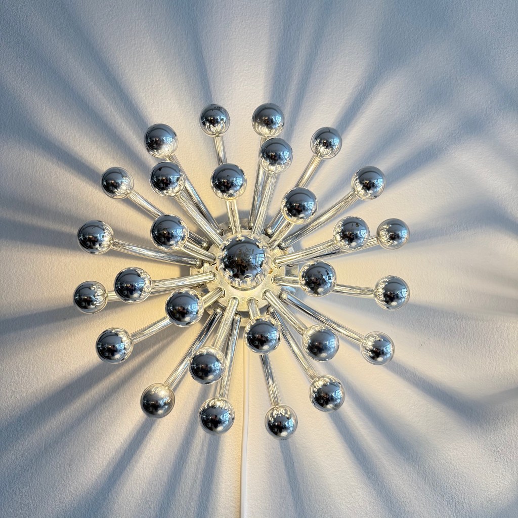 Pair of Chrome Pistillo Lamps by Studio Tetrach. Produced by Valenti Luce. Available at heyday möbel, Grubenstrasse 19, 8045 Zürich.