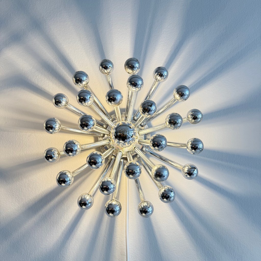 Pair of Chrome Pistillo Lamps by Studio Tetrach. Produced by Valenti Luce. Available at heyday möbel, Grubenstrasse 19, 8045 Zürich.